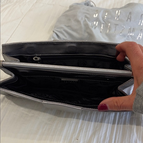 Stuart Weitzman Metallic Silver Leather Lace-Trim Wristlet Clutch
